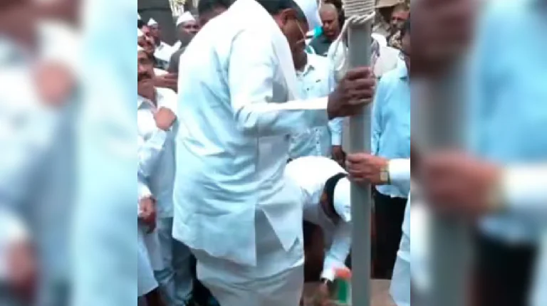 worker removes cm siddaramaiah s shoes