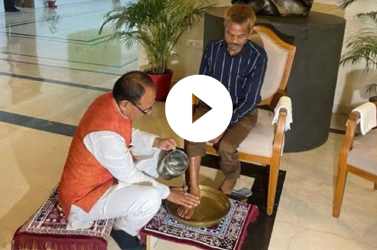 MP CM Shivraj Chouhan washes feet of urination victim, honours him with a shawl